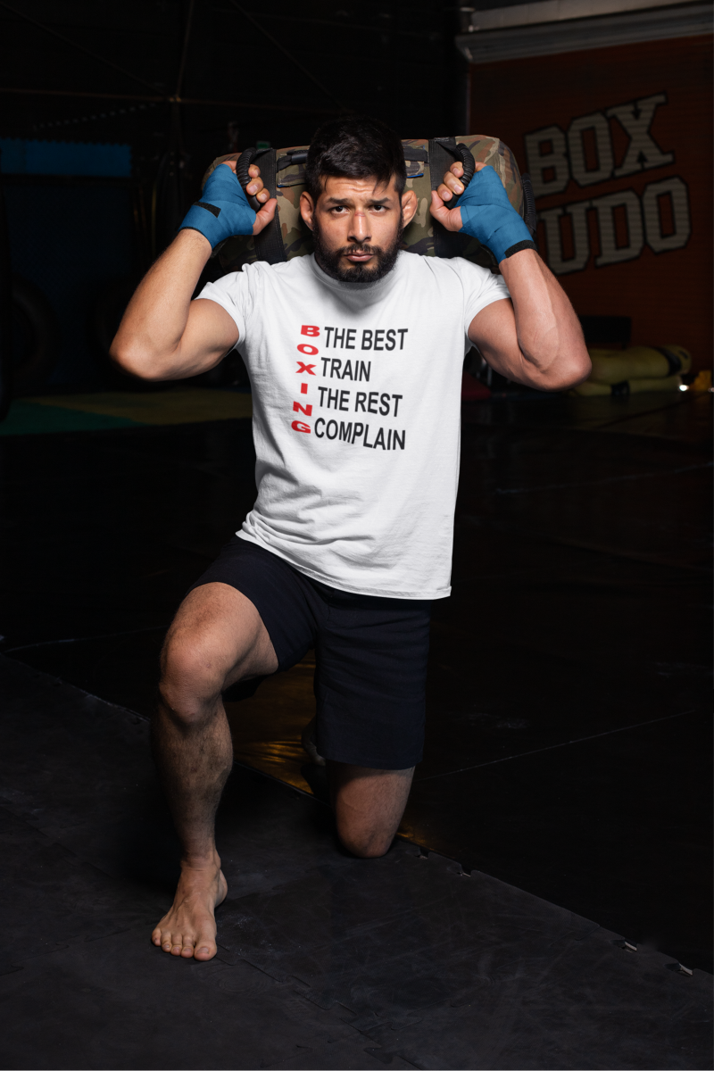 t-shirt-mockup-of-an-mma-fighter-kneeling-at-a-boxing-gym-bela.png 